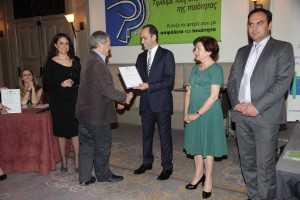 Dr Michael I. Loizides receives ISOTECH's certificate  from the Minister of Finance